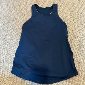 Lululemon running tank with built in bra and phone holder.